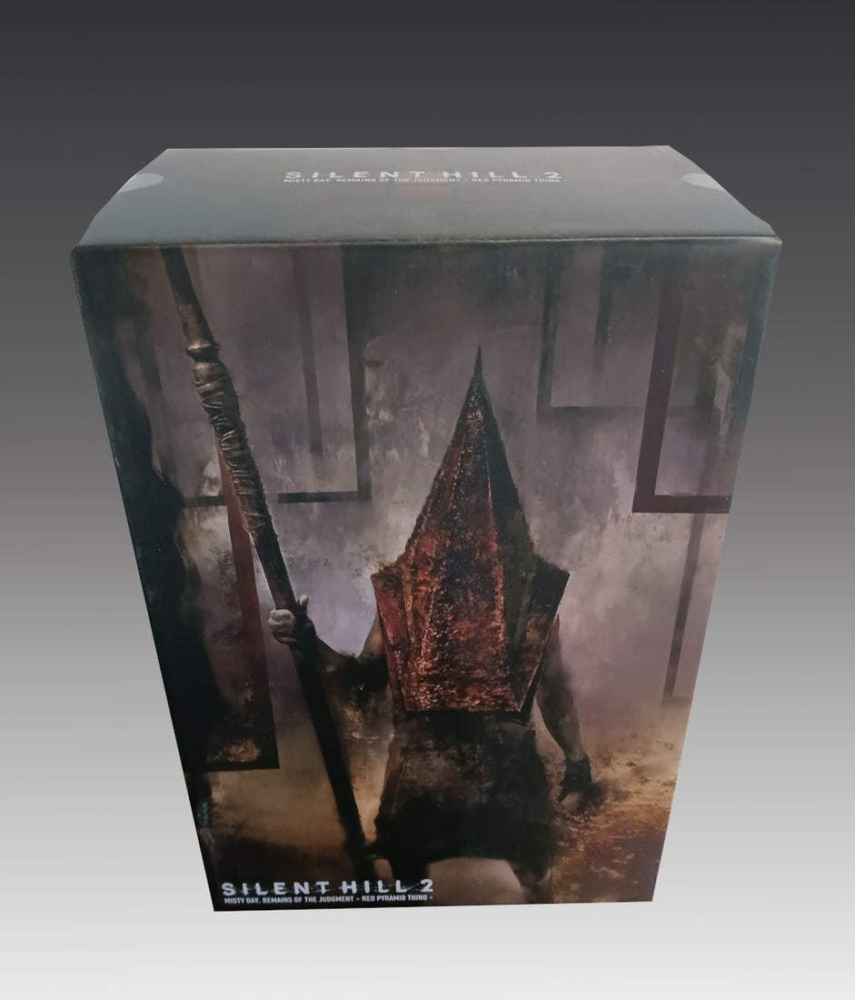 SIDESHOW & GECCO RED PYRAMID THING STATUE: SIDESHOW & GECCO RED PYRAMID THING STATUE: A sinister PVC statue created by Gecco Co. in collaboration with Sideshow Collectibles depicting the Red Pyramid Thing (also known as "Pyramid Head") from th
