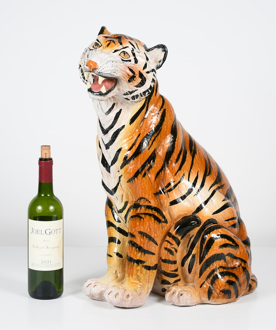 ITALIAN MAJOLICA TERRACOTTA TIGER: ITALIAN MAJOLICA TERRACOTTA TIGER: A vintage Italian Seated Tiger with an open mouth growling appearance. Nicely hand-glazed. Approx. 23.25" h x 11.5" w x 16" d.