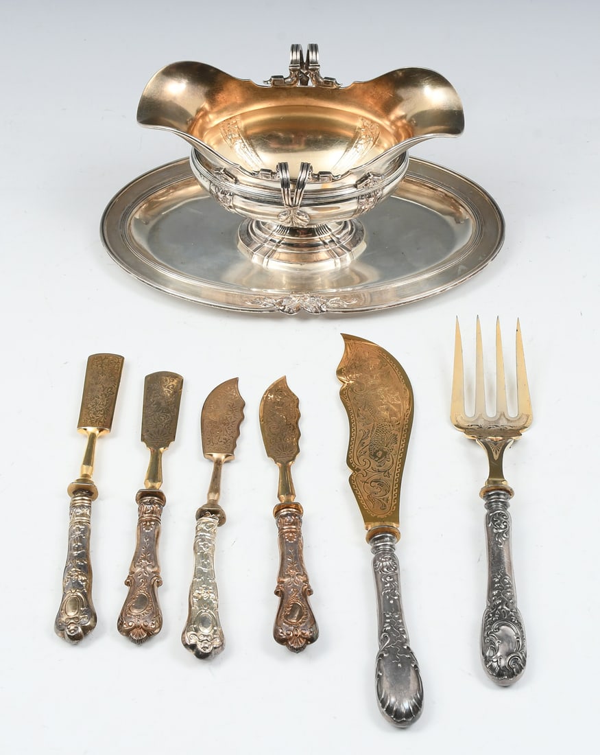 .800 FINE SILVER GRAVY BOWL & 6 PC. FISH SET: .800 FINE SILVER GRAVY BOWL & 6 PC. GOLD-WASHED FISH SET: Approx. 20.34 Troy ounces; Comprising; 1- German Bruckmann & Sohne Gravy Boat with attached Under Plate. Also included is a 6 pc. Continental