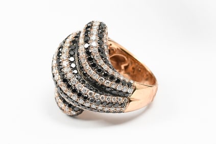 MODERNIST 18K GOLD BLACK AND WHITE DIAMOND RING