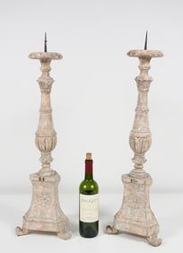 PAIR OF CARVED AND PAINTED GESSO CANDLE PRICKS