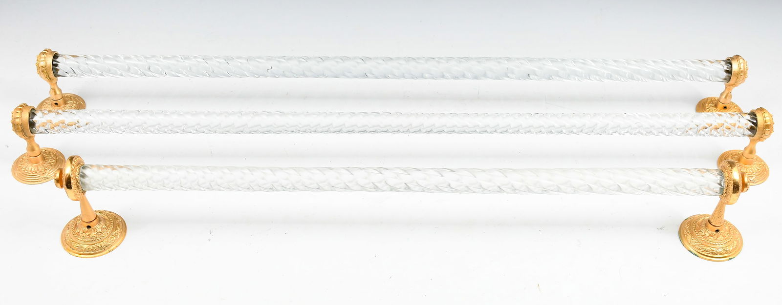 SHERLE WAGNER BRONZE BATH ACCESSORIES: SHERLE WAGNER BRONZE BATH ACCESSORIES: 2 towel bars and one hand towel bar, 2 x 3" h. with 30" twisted glass rods, 1 x 4" with 24" twisted glass rod. Acanthus leaf motif bronzes are marked Spain.