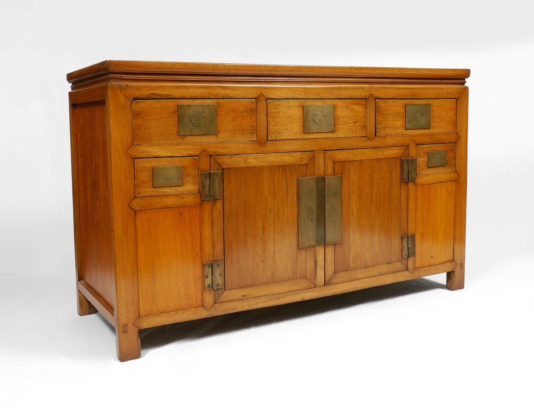 ORIENTAL TEAKWOOD CREDENZA: ORIENTAL TEAKWOOD CREDENZA: Through tenon construction, 3 drawers over 4 doors. Brass hinged pulls. 33 3/4" h. x 55 1/4" x 20 1/2".