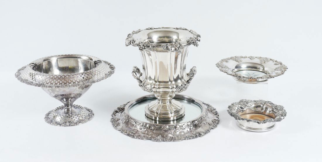 5 PIECE SILVERPLATE TABLE ACCESSORIES: 5 PIECE SILVERPLATE TABLE ACCESSORIES: An assembled 5 pieces total to include 1) Barbour Silver Co. reticulated center bowl with insert. Grape bin motif rim. 7 1/4" h. x 12 3/4". 2) Barbour Silver Co.