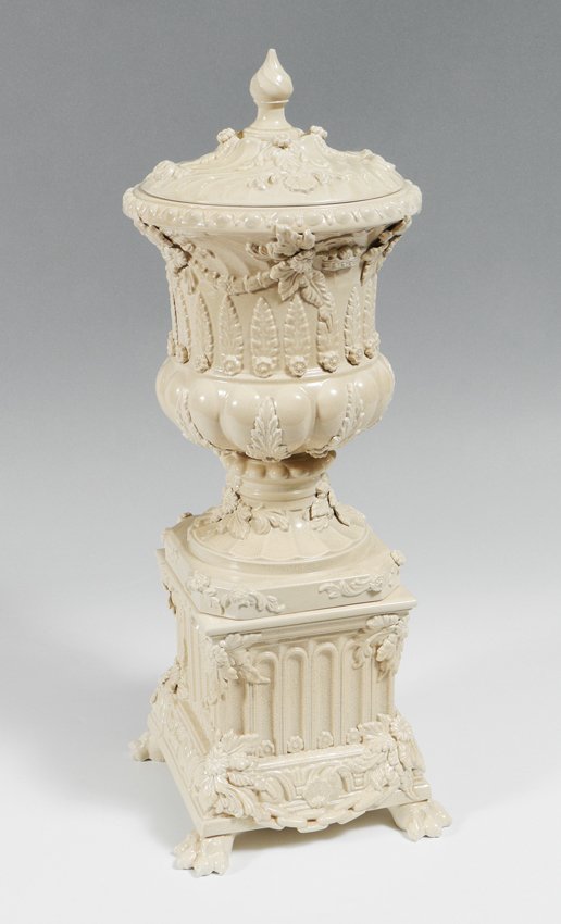 STAFFORDSHIRE PETER WELDON CREAMWARE COVERED URN: STAFFORDSHIRE PETER WELDON CREAMWARE URN ON STAND: Adamesque style covered urn and stand. Mark of Peter Weldon. Note: This piece is comprised of three pieces comprising two sections and a lid. Measure