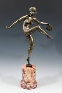 LAUREL ART DECO NUDE TAMBOURINE DANCER BRONZE: LAUREL, Pierre, (French, 1892-1962): Art Deco Nude Woman Mid-Dance holding a Tambourine, 14.5" in height, overall 19.75" in height with cylindrical plinth, incised signature at the figure's base,