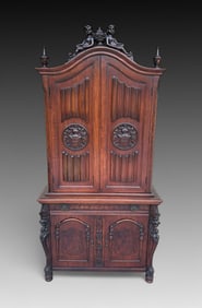 CARVED LINEN FOLD CUPBOARD W/ CHERUB FINIAL