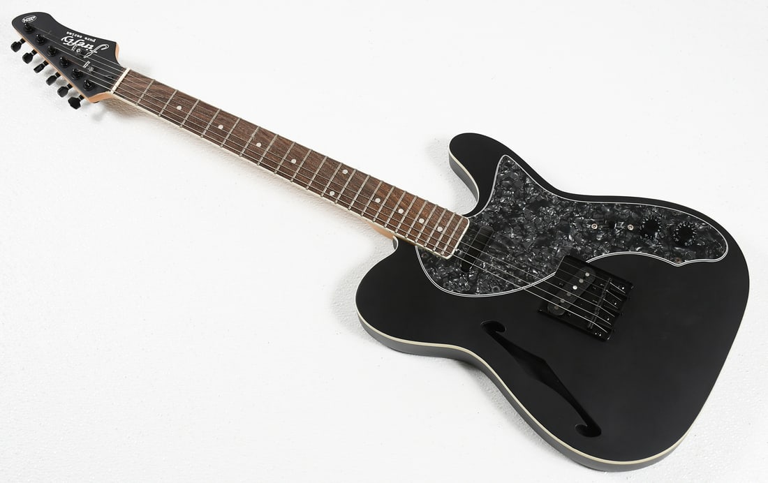 FIREFLY PURE SERIES 6-STRING ELECTRIC GUITAR: FIREFLY PURE SERIES 6-STRING ELECTRIC GUITAR: Serial #101907036, Flat Black Hollow body with a Maple neck and Rosewood fingerboard with inlaid Mother of Pearl dots. Appears to have never been played d