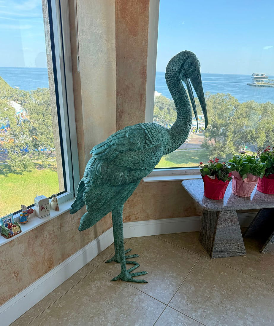 TWO LIFESIZE EGRET BRONZES: TWO LIFESIZE EGRET BRONZES: Patinated Bronze, one 59” in height, other 51” in height. Good-quality casting, weight, and finish.