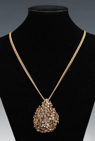 18K DIAMOND PENDANT ON CURB CHAIN