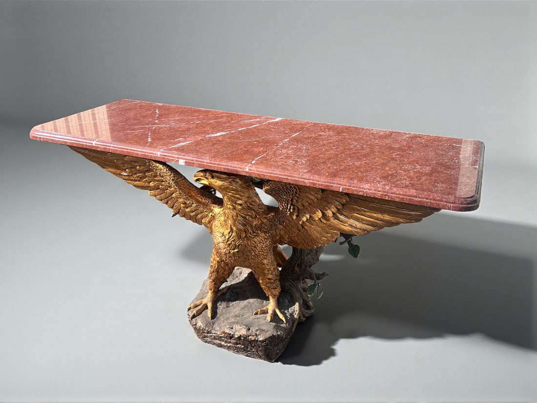 CHESTER FIELDS BRONZE EAGLE MARBLE TOP TABLE: CHESTER FIELDS BRONZE EAGLE MARBLE TOP TABLE: Large Cast Bronze Eagle & Tree form Limited Edition table base, surmounted by a beveled marble top. Approx. 34.25" h x 88.125" w x 23.625" d.