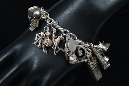STERLING & .800 FINE CHARM BRACELET