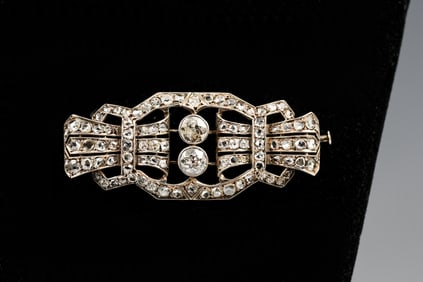VINTAGE STERLING AND DIAMOND BROOCH