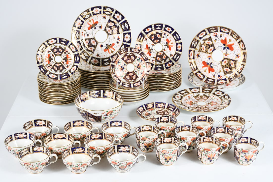 73 PC ROYAL CROWN DERBY IMARI PORCELAIN DINNERWARE: 73 PC ROYAL CROWN DERBY IMARI PORCELAIN DINNERWARE: Comprising 12 Dinner Plates; 12 Salad Plates; 1 Desert Plate; 14 Bread and Butter Plates; 1 Waste Bowl; 9 Coffee Cups; 11 Tea Cups; 11- 6" Saucers;