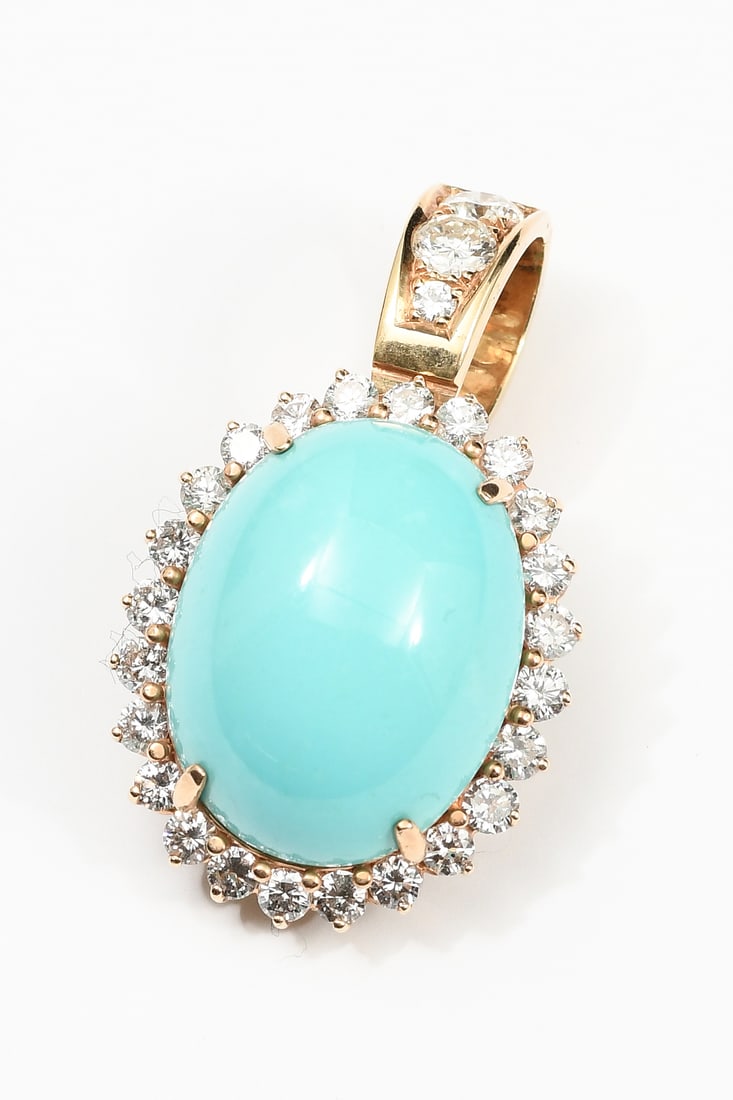 14K GOLD DIAMOND & TURQUOISE ENHANCER: 14K GOLD DIAMOND & TURQUOISE ENHANCER: 14K yellow gold turquoise and diamond enhancer/pendant contains 1 oval cabochon piece of turquoise measures approximately 22.00 x 17.00 mm with no veining and no