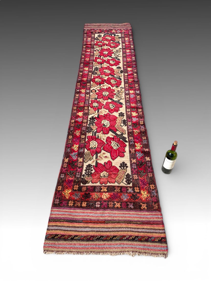 ESTATE ORIENTAL CARPET FLORAL KILIM RUNNER: HANDWOVEN TRIBAL RUNNER FLATWOVEN KILIM CENTER PANEL AND KILIM ENDS: The Kilim woven floral center panel with the surrounding areas of knotted wool pile, an uncommon hybrid construction characteristic