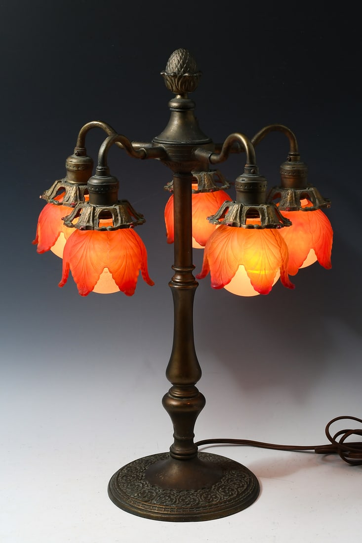 BRADLEY & HUBBARD FOLIATE MOTIF BRONZE LAMP: BRADLEY & HUBBARD FOLIATE MOTIF BRONZE LAMP: A 5- Light Bradley & Hubbard Bronze lamp base, circa 1915, having a scrolled Shamrock motif. Surmounting Pine Cone finial over 5- Goose neck arms with Foli