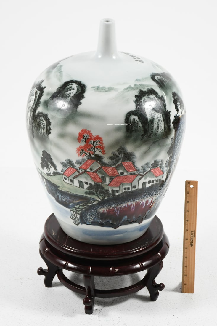 SCENIC CHINESE FAMILLE ROSE VASE ON STAND: SCENIC CHINESE FAMILLE ROSE VASE ON STAND: Chinese porcelain republic style Famille rose vase, having a traditional scenic Mountainous Village scene. Approx. 20.75" h x 14.5" dia. With base Approx. 27