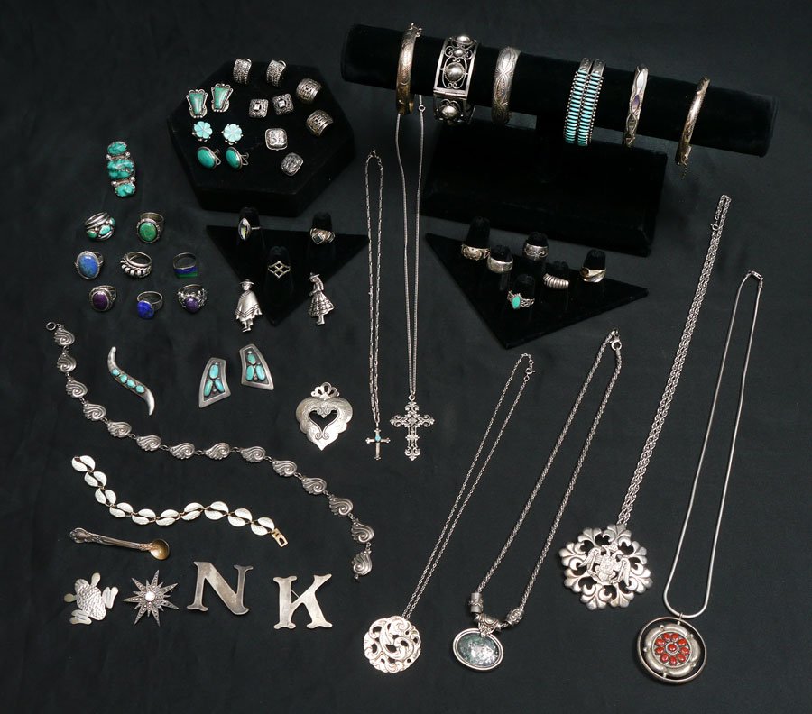 A TREMENDOUS ESTATE COLLECTION STERLING JEWELRY: A TREMENDOUS ESTATE COLLECTION STERLING JEWELRY: Including a pendant with Imperial Russian double eagle design, David Anderson enamel bracelet, Danecraft necklace, a Zuni spinning pendant with turquoi