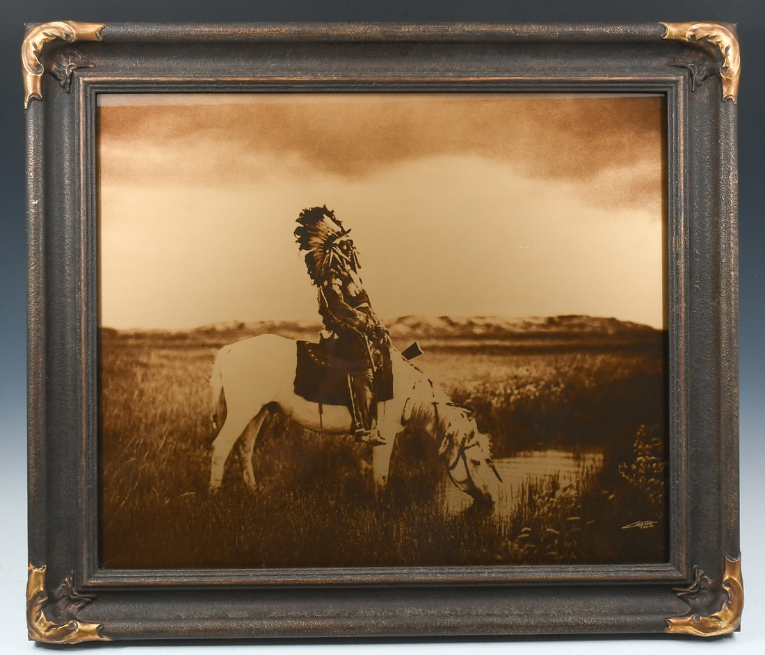 "AN OASIS IN THE BADLANDS" 1905 CENTENNIAL OROTONE AFTER EDWARD CURTIS: "AN OASIS IN THE BADLANDS" 1905 CENTENNIAL OROTONE AFTER EDWARD CURTIS: Sight size 19.5" x 23.5", encased in Master Framers Curtis Replica frame, 25" x 29".