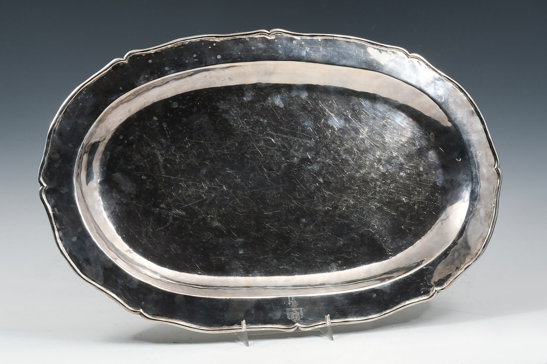 ANTIQUE STERLING SILVER ARMORIAL PLATTER: ANTIQUE STERLING SILVER ARMORIAL PLATTER: Approx. 29.04 Troy ounces. Antique Sterling Silver Platter, having a shaped rim with an Armorial Crest. Not marked, but has been tested to verify Silver