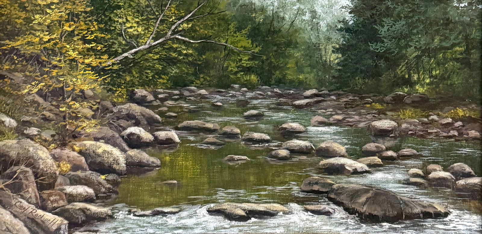 CAROL ROCKWELL SUMMER STREAM PAINTING: ROCKWELL, Carol, (American, 20th/21st Century): Summer Stream, Oil/Canvas, 12" x 24", signed lower left, artist’s business card affixed verso, framed, 19" x 31".