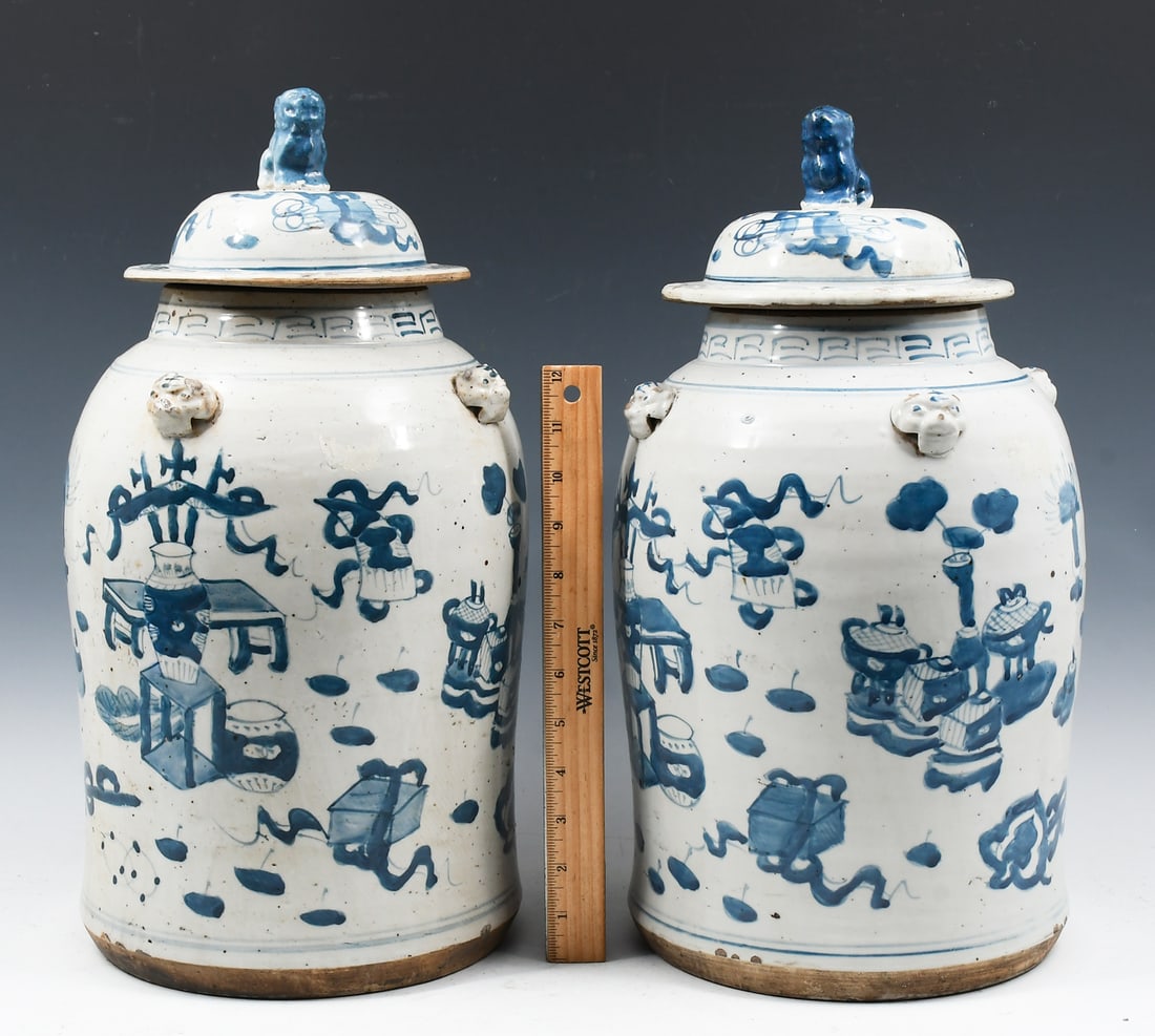 PR. 19TH-C. CHINESE BLUE & WHITE SCHOLARLY JARS: PR. 19TH-C. CHINESE BLUE & WHITE SCHOLARLY JARS: Pair of 19th-century Blue & White Porcelain lidded Jars, having a Scholarly motif. Numerous Auspicious & Literal symbols. Lid surmounted by Foo Dogs. A