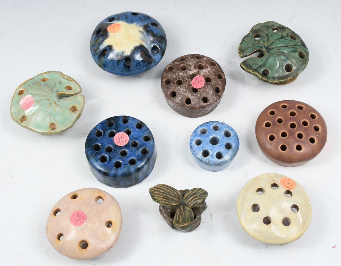 10 PC. ART POTTERY FLOWER FROGS: 10 PC. ART POTTERY FLOWER FROGS: Largest measures 4.5" in diameter.
