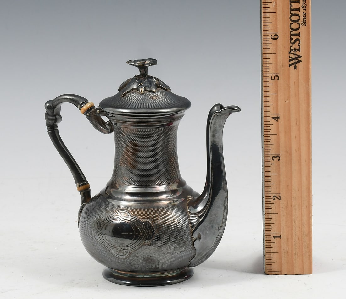 FRENCH CHRISTOFLE SILVERPLATED CREAMER: FRENCH CHRISTOFLE SILVERPLATED CREAMER: French Silver plated Christofle Creamer, having a Floral finial and an intricate Diamond etched design, monogrammed. Approx. 5.5" h x 5.25" w x 3.25" d.