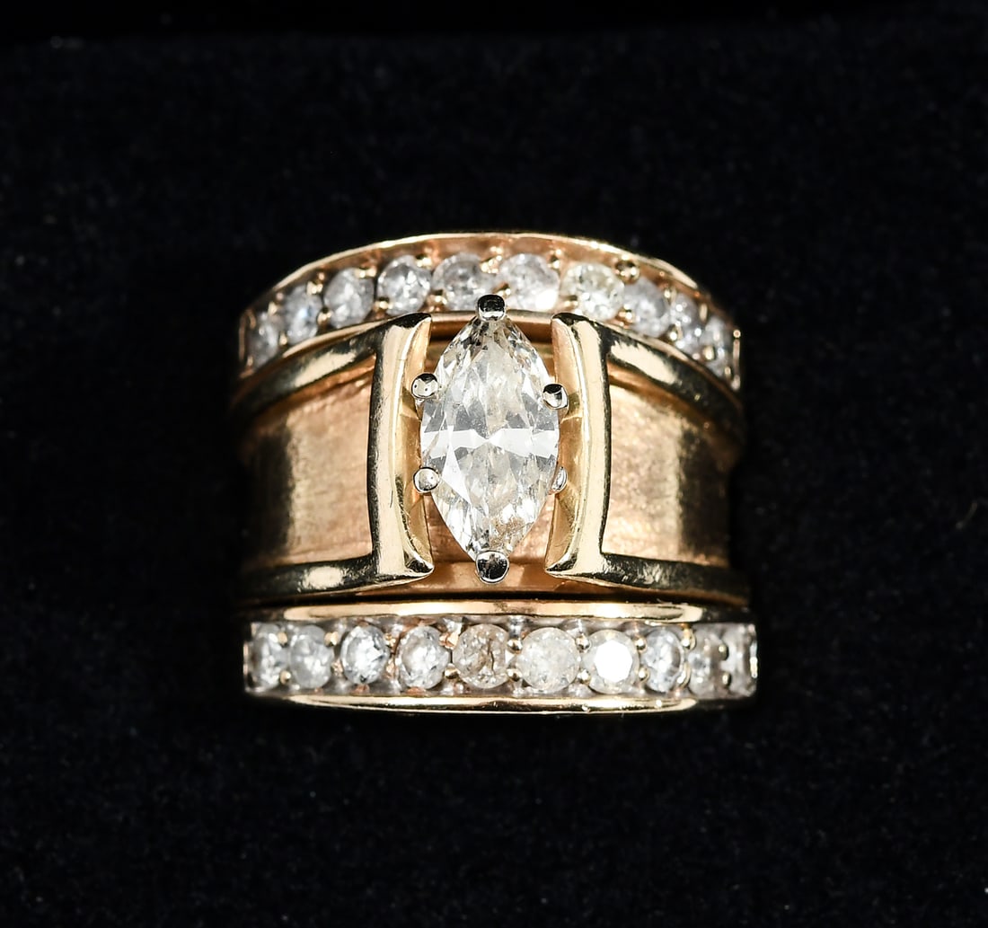 14K GOLD AND LARGE MARQUISE DIAMOND RING: 14K GOLD AND LARGE MARQUISE DIAMOND RING: A 3-piece 14 karat yellow gold (marked) polished tapered ring set that is soldered together and measures from 9.1 mm wide at the base to 18mm wide across the 