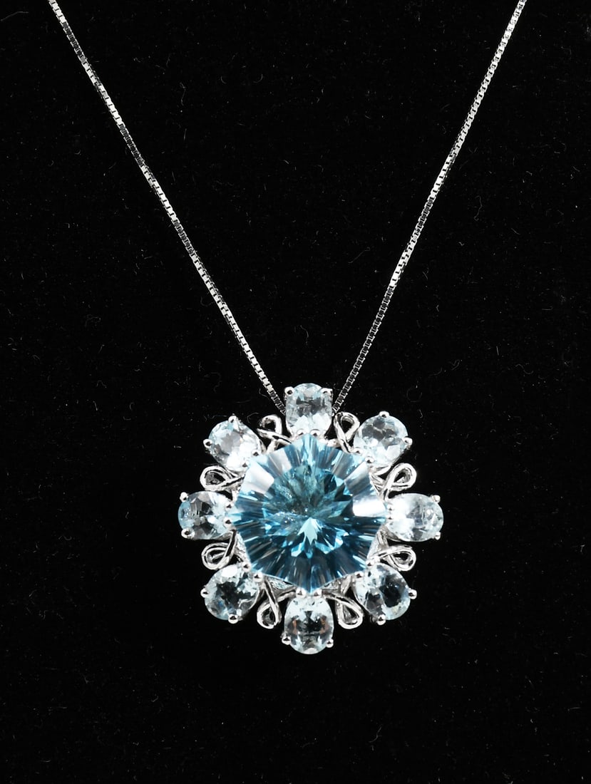 14K BLUE TOPAZ & AQUAMARINE PENDANT ON 14K CHAIN: 14K BLUE TOPAZ & AQUAMARINE PENDANT ON 14K CHAIN: 14 karat white gold Blue Topaz & Aquamarine necklace, Pendant by EFFY, Blue Topaz: Fantasy cut, 6.0 carats (estimated) surrounded by 8 oval cut Aquama