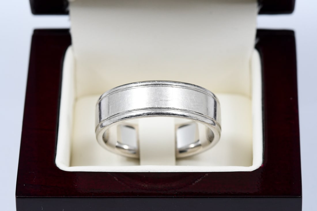 PLATINUM WEDDING BAND: PLATINUM WEDDING BAND: Platinum wedding band by Ahee. Size: 11.5. Weight: 20.7 grams.