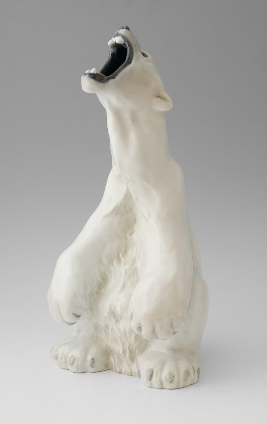 ROYAL COPENHAGEN 502 ROARING POLAR BEAR FIGURE: ROYAL COPENHAGEN PORCELAIN ROARING POLAR BEAR FIGURE: Figure of a seated polar bear roaring. #502, 13'' h. x 6'' x 6''.