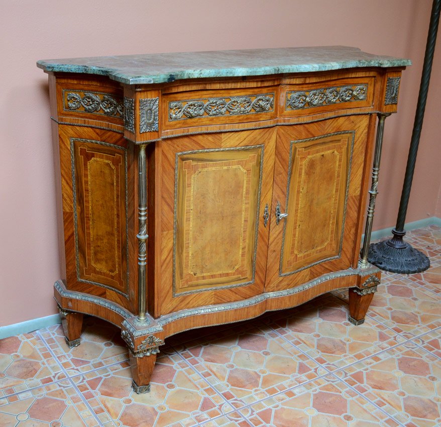 FRENCH MARBLE TOP SIDE CABINET: FRENCH MARBLE TOP SIDE CABINET: Shaped green variegated marble top, serpentine front with 2 drawers over 2 doors. Parquetry inlay and applied ormolu decoration all over. Cast metal full column support