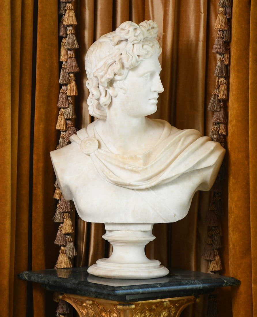 MARBLE BUST AFTER THE APOLLO BELVEDERE: MARBLE BUST AFTER THE APOLLO BELVEDERE: After the famous antique marble housed in the Vatican. Measures 22" in height.