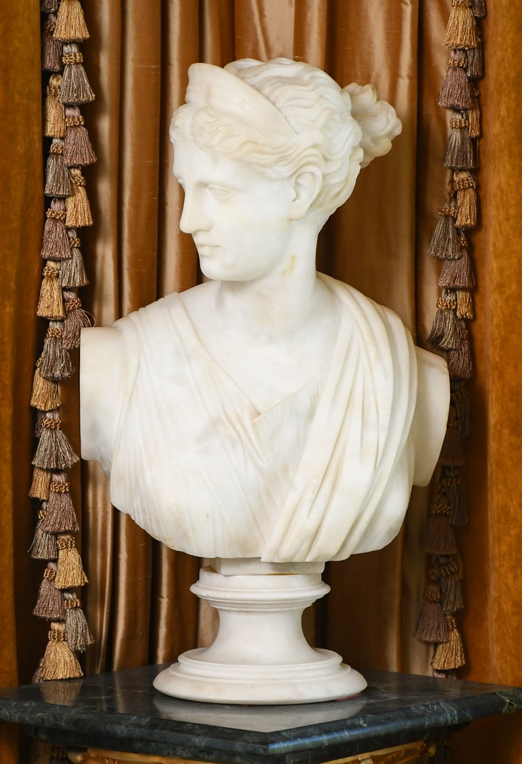 MARBLE BUST AFTER THE DIANA OF VERSAILLES: MARBLE BUST AFTER THE DIANA OF VERSAILLES: After the famous marble statue housed in the Louvre museum in Paris, France. Measures 21" in height.