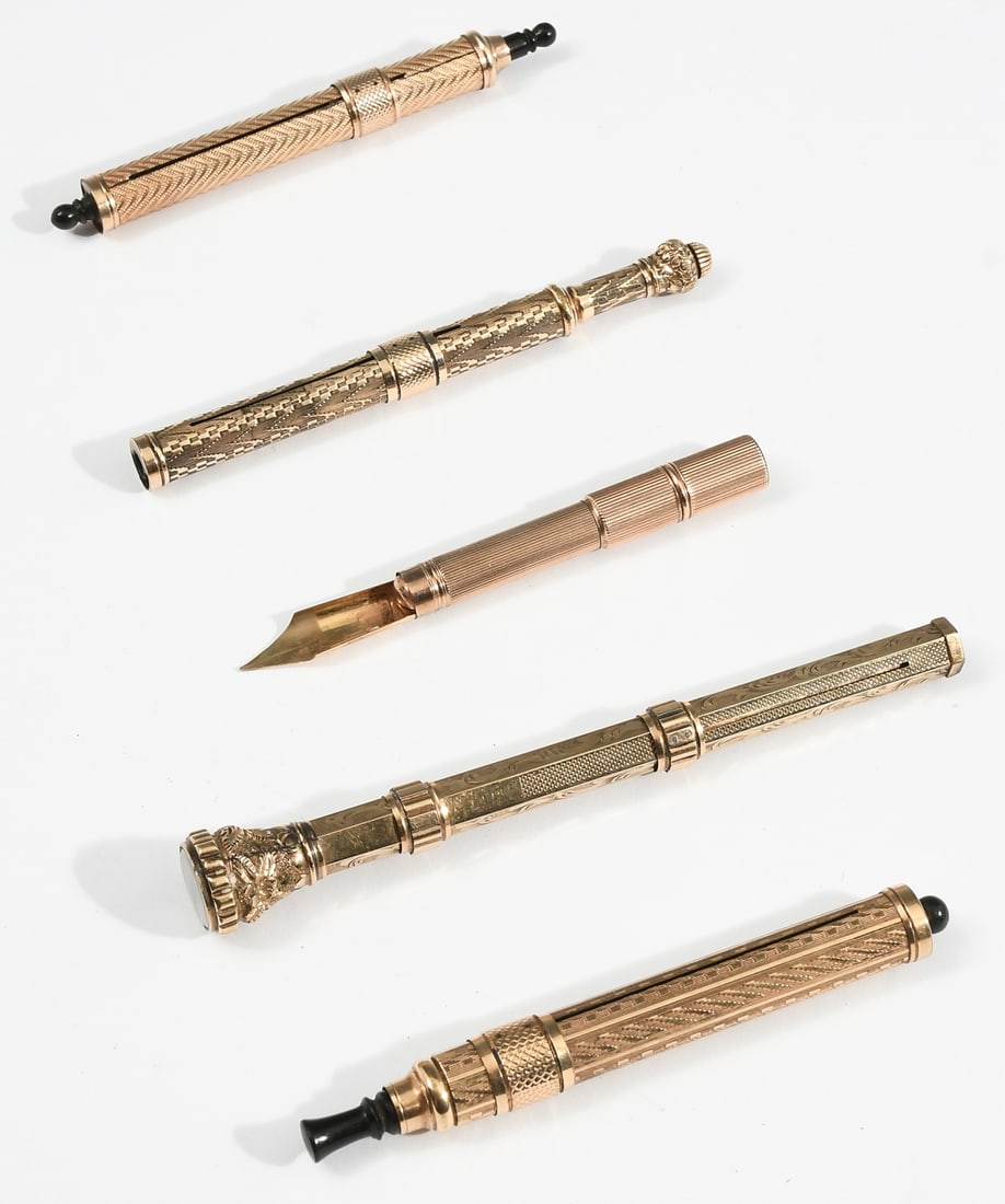 5PC. LARGE GOLD TONE NIB DIP PENS, ONE 14K: 5PC. LARGE GOLD TONE NIB DIP PENS, ONE 14K: A collection of five gold tone large nib retractable dip pens Companies included Mabel Todd & Co., Edward Todd & Co., William, and Eversharp, all in gold