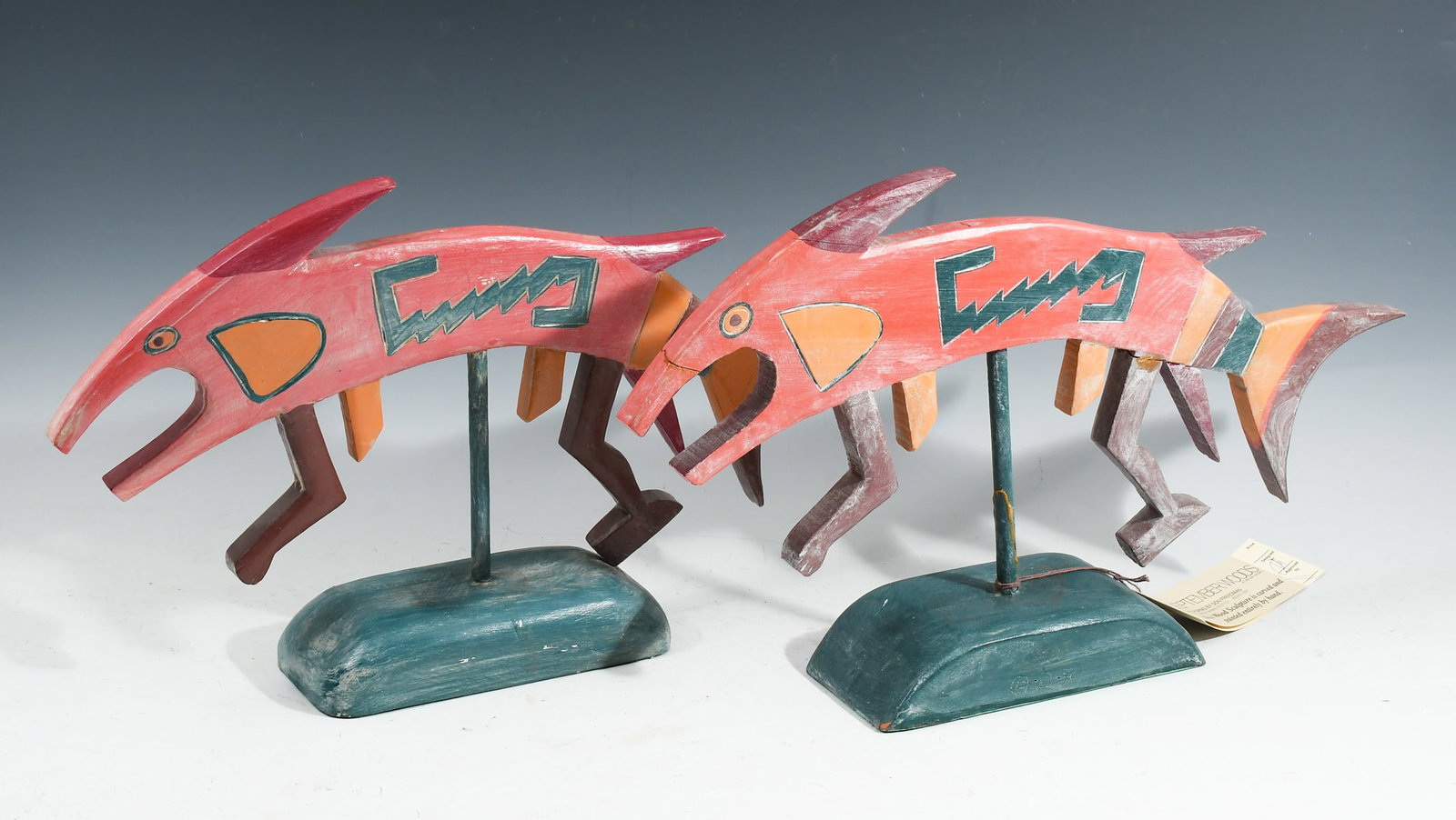 PAIR OF DON FREEDMAN CARVED AND PAINTED FIGURAL SC: FREEDMAN, Don, (American, 20th Century): "Azumi Warriors", each approximately 9.5" in height and 18" in length, one has an original tag from the September Woods Gallery.