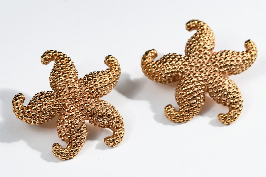 14K GOLD STARFISH EARRINGS: 14K GOLD STARFISH EARRINGS: A pair of 14K gold earrings in the form of starfish with a very textural surface. Weight: 4.8 grams.