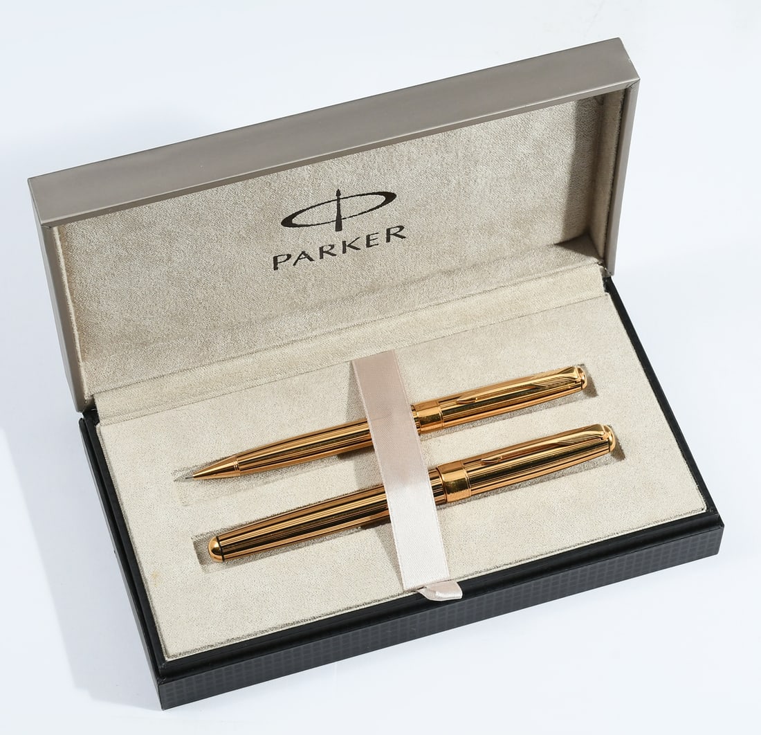 PARKER SONNET ATHENES PEN SET: PARKER SONNET ATHENES PEN SET: A Parker Sonnet Athenes fountain pen and matching ballpoint features a 23K gold-plated and black lacquered vertical pinstripe design. The fountain pen is outfitted with 