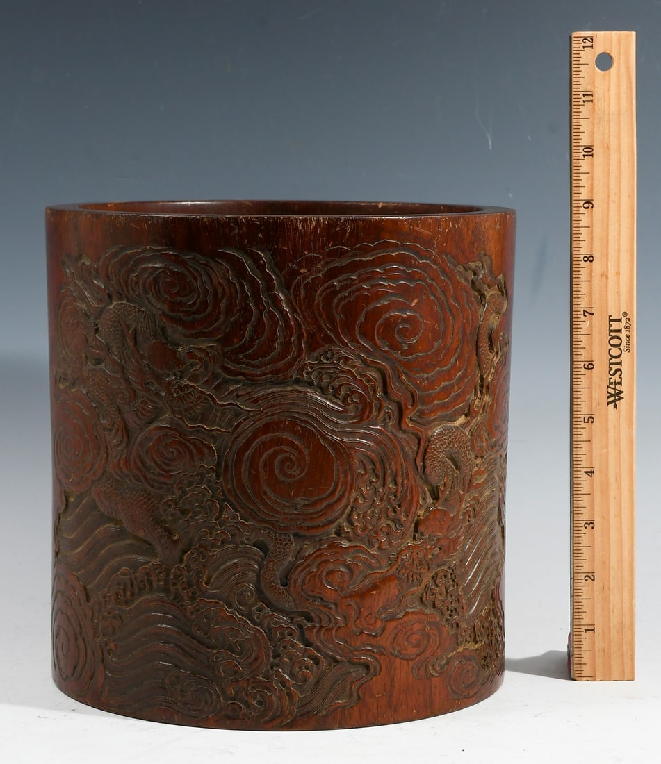 CHINESE QING DYNASTY HUANGHUALI DRAGON BRUSH POT: CHINESE QING DYNASTY HUANGHUALI DRAGON BRUSH POT: Late Chinese Qing Dynasty Brush Pot, made of Huanghuali wood, having Dragons amongst a stylized Cloud & Water design. Other side has a Calligraphy Poe