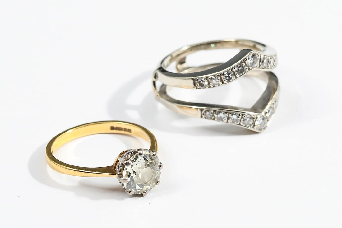 18K GOLD DIAMOND RING WITH 14K GOLD DIAMOND JACKET: 18K GOLD DIAMOND RING WITH 14K GOLD DIAMOND JACKET: 18 karat yellow gold & Platinum Solitaire with 1 old mine cut diamond at 1.41 carats, rated I-J in color and SI-1 in clarity. Finger size: 5.75. 2.8