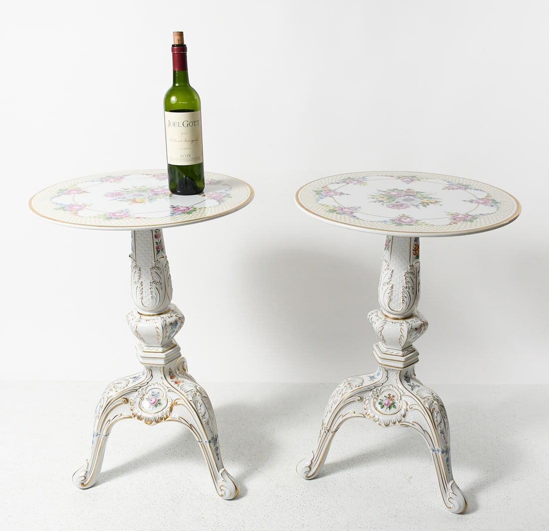 PR. GERMAN DRESDEN PORCELAIN TABLES: PR. GERMAN DRESDEN PORCELAIN TABLES: Pair of German Dresden Porcelain enameled tables, having a Floral Blossom motif with Gold accents. Raised on a tripod base with Acanthus & Shell motif feet. Approx