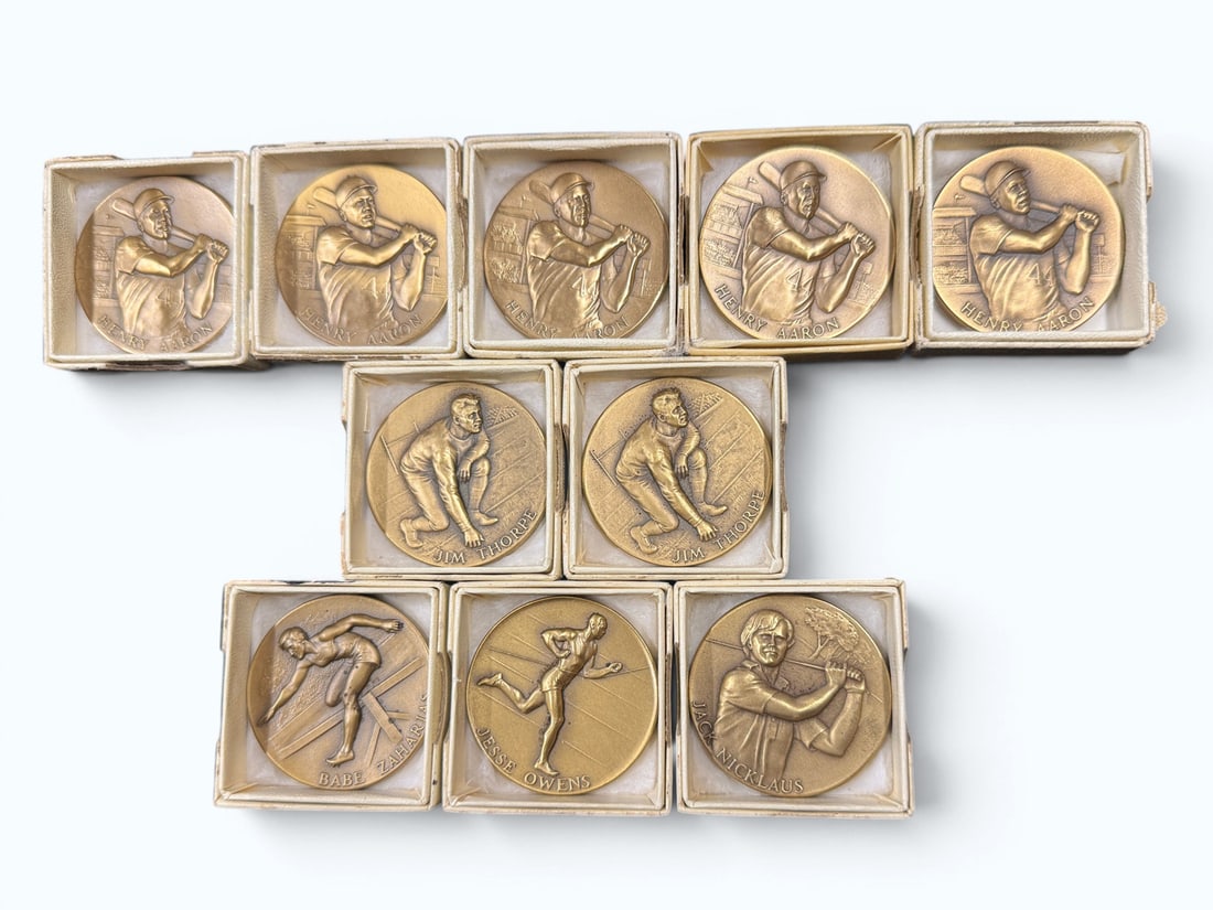 10 PC. BRONZE MEDAL HALL OF CHAMPIONS LOT: 10 PC. BRONZE MEDAL HALL OF CHAMPIONS LOT: Ten medals produced by the Medallic Art Company, consisting of five Henry Aaron, two Jim Thorpe, one Babe Zaharias, one Jesse Owens, and one Jack Niklaus. Al
