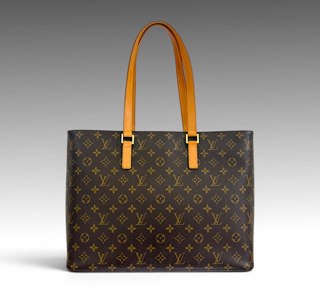 LOUIS VUITTON TOTE BAG: LOUIS VUITTON TOTE BAG: Louis Vuitton Luco structured zip tote bag in monogram canvas. Dimensions are approximately Length 17" depth 4" & height 12", with a 10" drop handle. Louis Vuitton dust bag inc