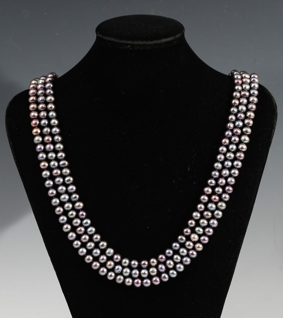 18K TRIPLE STRAND FRESHWATER PEARL NECKLACE: 18K TRIPLE STRAND FRESHWATER PEARL NECKLACE: 3 strands of 5.00 mm dyed freshwater cultured pearls. 18K clasp contains 47 round brilliant cut diamonds. Weight: .50 Ct. Approx. Rated I1 in clarity and