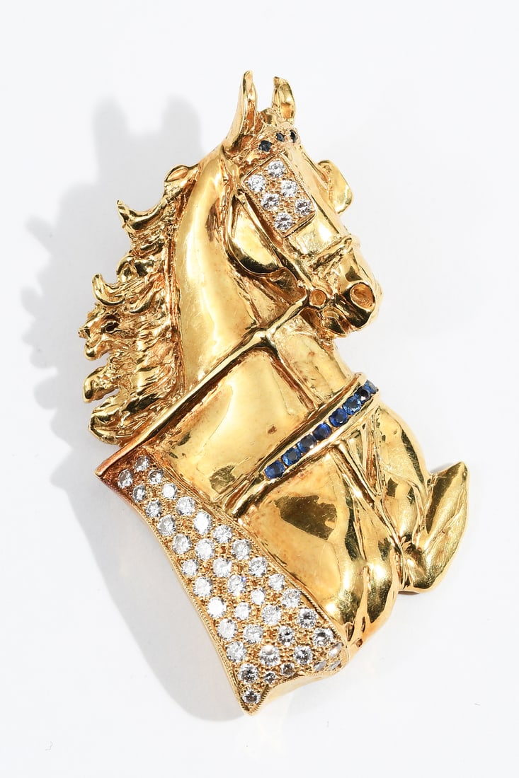 14K CUSTOM DIAMOND HORSE BROOCH/PENDANT: 14K CUSTOM DIAMOND HORSE BROOCH/PENDANT: 14K yellow gold custom harness racing horse contains 45 round brilliant cut diamonds. Weight: 1.00 Ct. Approx. Rated VS in clarity and G-H in color. 8 round