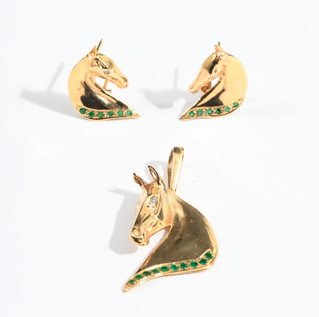 14K CUSTOM HORSE PENDANT EARRING SET: 14K CUSTOM HORSE PENDANT EARRING SET: Custom 14K yellow gold horse pendant and earring set contains 22 round mixed cut emeralds. Weight: .25 Ct. Approx. Emeralds are prong set. Post and hinged clip