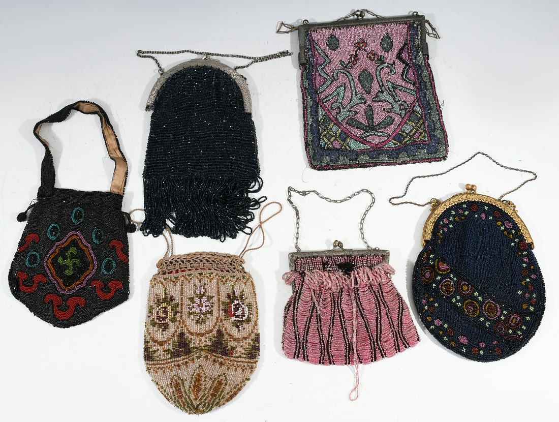 6 VINTAGE BEADED PURSES: 6 VINTAGE BEADED PURSES: A delightful collection of vintage Victorian ornately beaded purses. The ornate designs include ones that are floral and others are geometric designs. 2 have bead fringe and 2