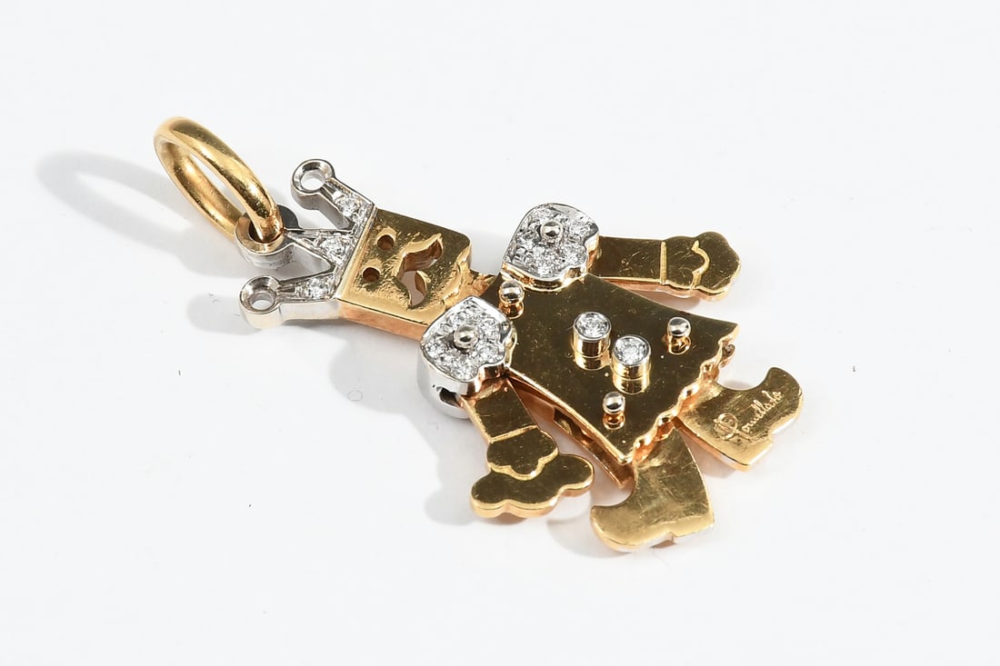 18K 2-TONE POMELLATO "KING" DIAMOND PENDANT: 18K 2-TONE POMELLATO "KING" DIAMOND PENDANT: Yellow and white gold pendant/charm with an oval bale suspending a stylized figure of a king with articulated limbs. Featuring a diamond set crown, epaulet